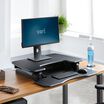 VariDesk® Pro Plus™ 30 Black in lowered position at office