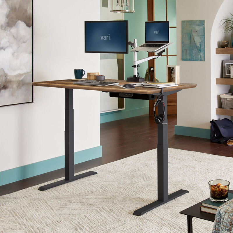 Electric Standing Desk 60x30 Reclaimed Wood in raised position at home image number null