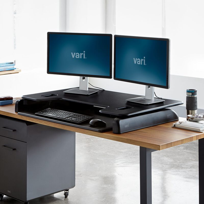 VariDesk® Tall 40 Black in lowered position at office image number null